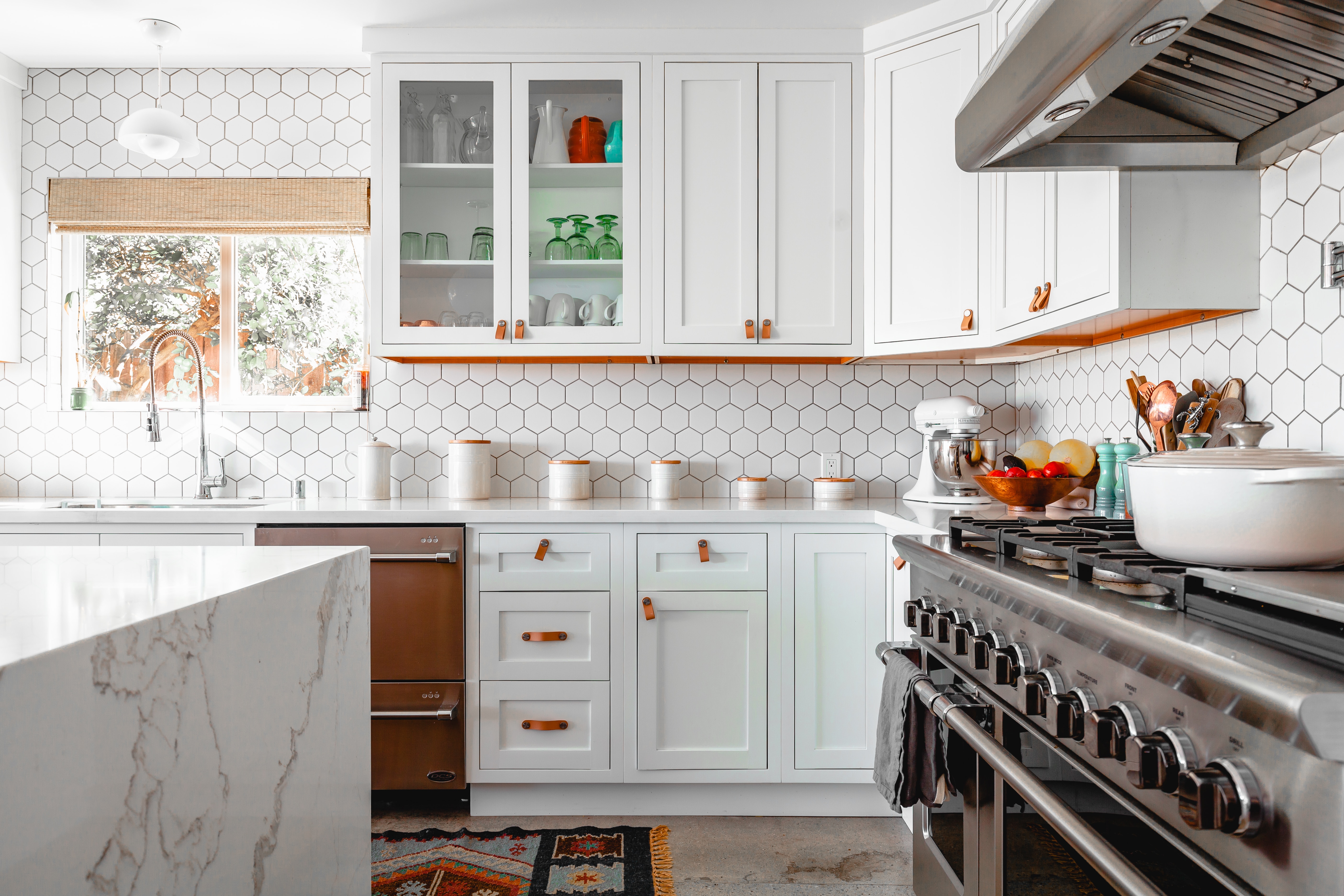 Beautiful kitchen with an orange accent color